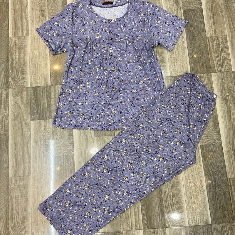 Tay ngắn Số 4 từ 50-57Kg cho người lớn tuổi. Người trẻ dưới 55 tuổi từ 57-65Kg Vòng 1 áo là 100cm . Dài 87 cm. áo 2 túi dún ngực có xẻ tà