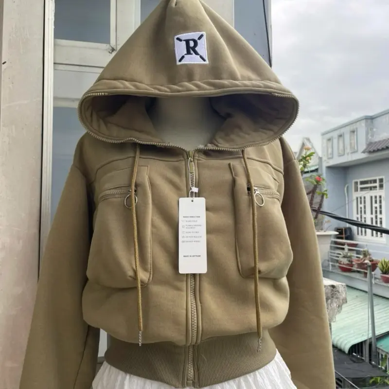 Áo khoác nỉ bông  túi hộp có khóa kéo.từ 40kg_60kg.from lửng
