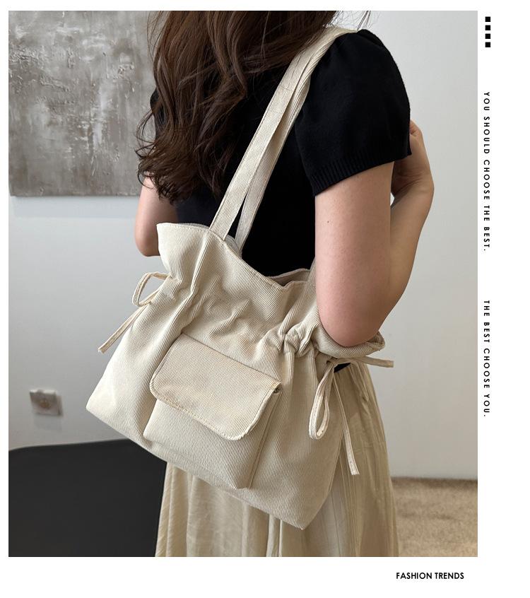 Product Introduction of New Korean Style Simple Shoulder Bag for Women with Drawstring Design, Fashionable Niche Commuter Underarm Bag, Elegant Versatile Handbag 0