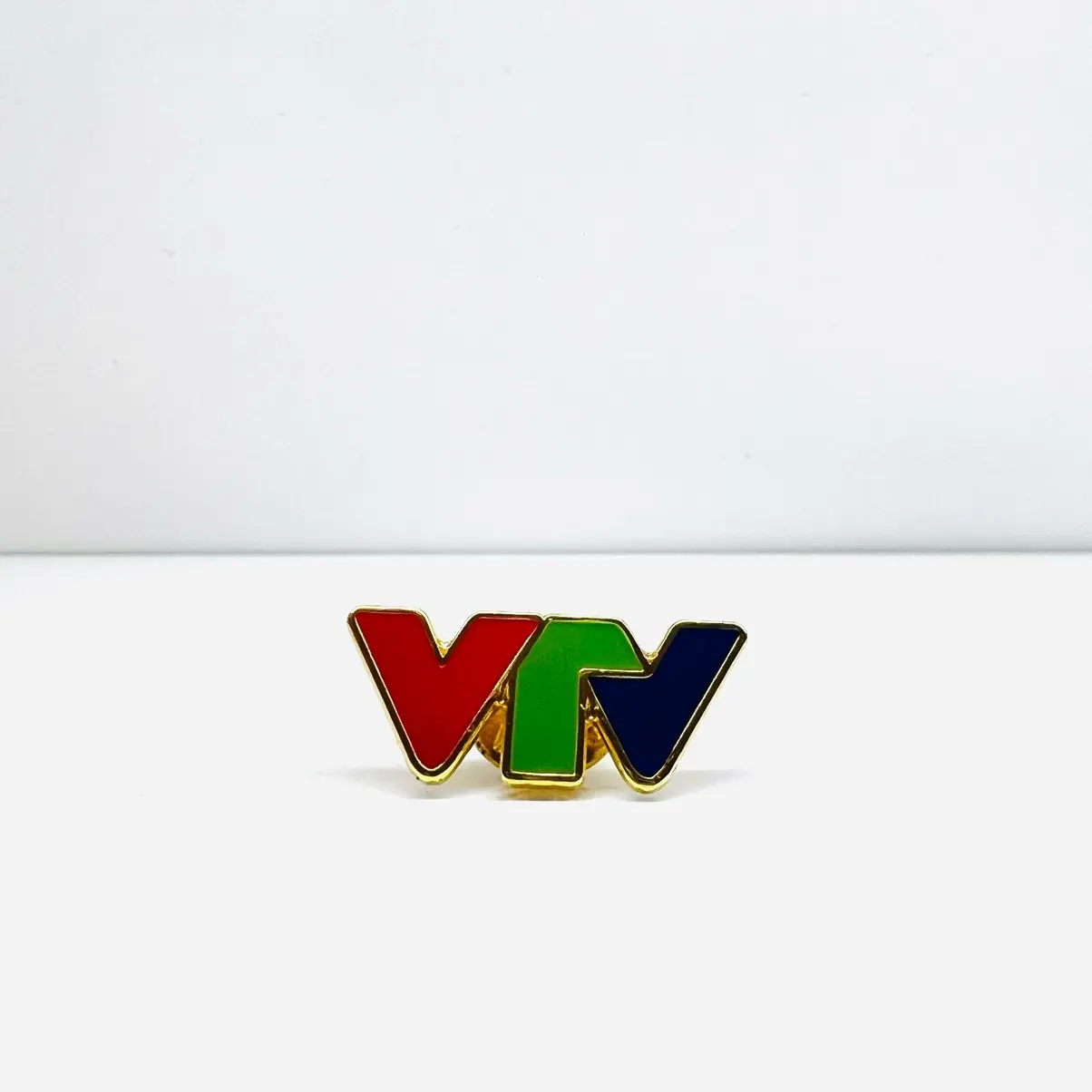 Huy hiệu VTV cài áo
