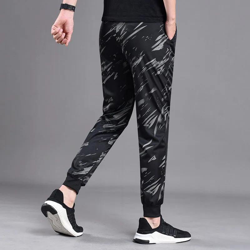 Product Introduction of Autumn Trousers Men Stretch Camouflage Pant Casual Leg Fitting Sweatpants Loose Wear-resistant Trousers 12