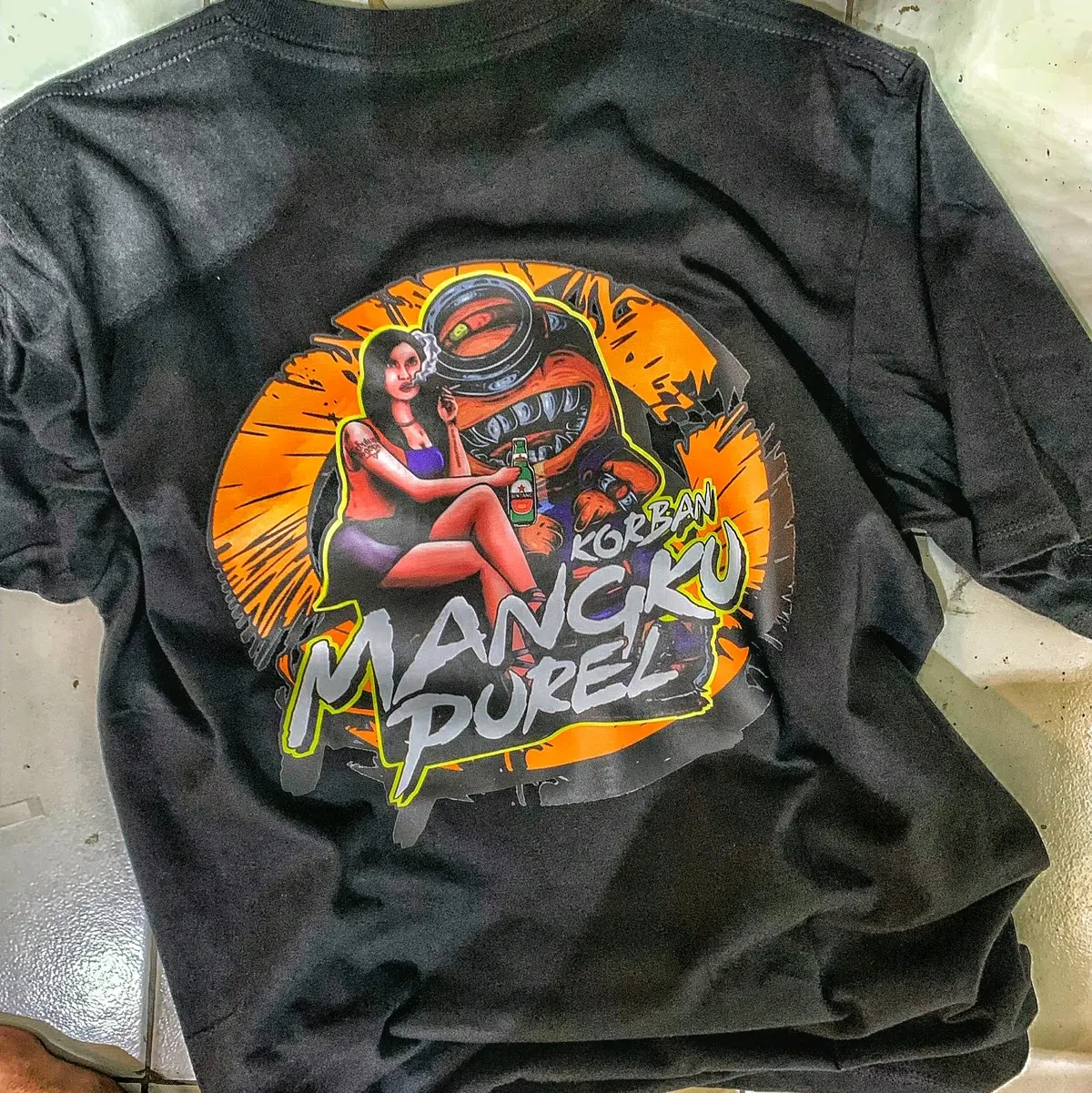 Kaos mangku purel