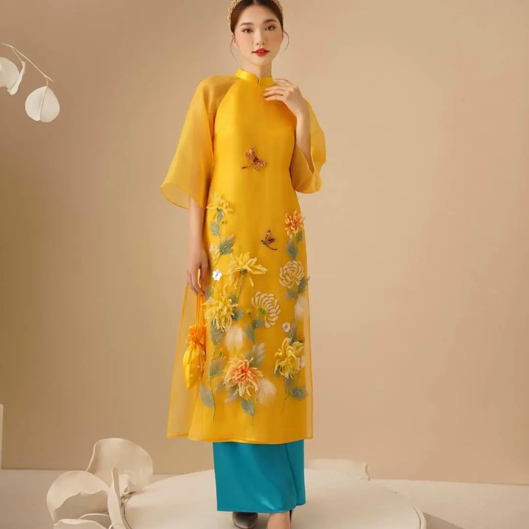 Áo dài cách tân Mộc Trà vàng mẹ và bé