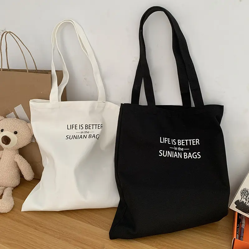 Artistic Letter Large Capacity Single Shoulder Canvas Bag for Men and Women Students School Handbag Korean Style Niche Design