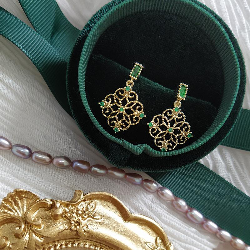 Product Introduction of Synthetic Zircon Inlaid Earrings, Classic Hollow Earrings, Women'S Retro Palace Earrings 1