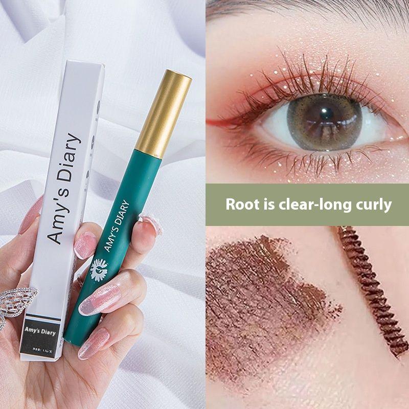 Mascara uốn sợi tổng hợp National Style, không lem, dày và mỏng, không phai màu.