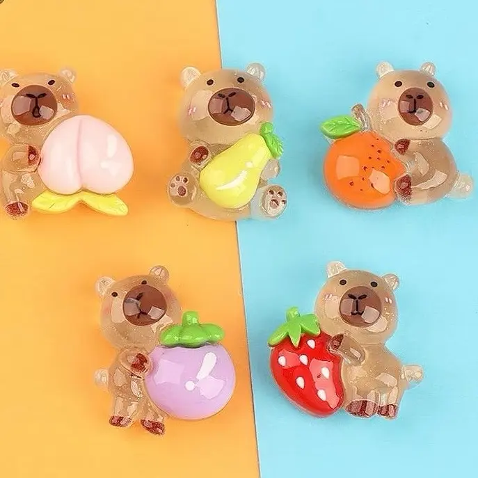 Combo charm Capybara ôm trái cây Kawaii, có túi mù tự xé trang trí 0