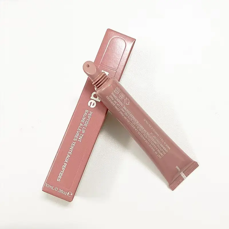 Rhode Glossy Lip Tint in Ribbon/Toast shades, moisturizing