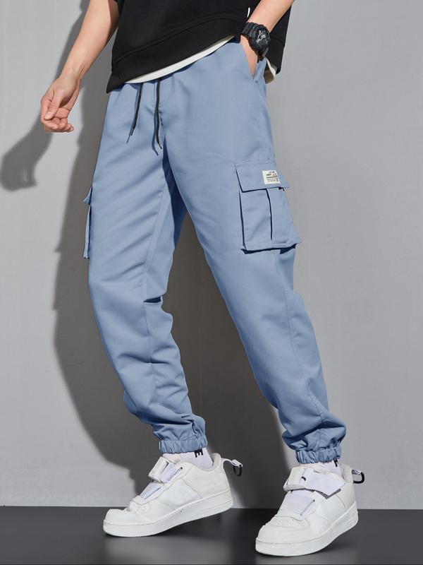 Men's Letter Patched Pocket Cargo Pants, Stylish Loose Drawstring Trousers, Drippy Outfits, Going Out Outfit, Menswear Clothing 2