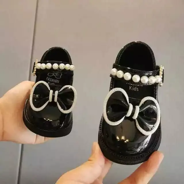 SEPATU DOCMART ANAK PEREMPUAN TALI MUTIARA PITA DUA LAYER UKURAN 22-35 FASHION ANAK Kaki