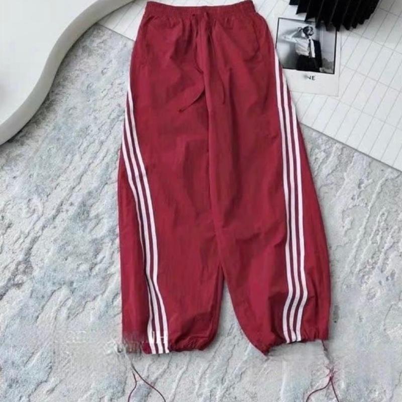 (Combo 2 quần) Quần dài ống rộng. Quần gió lưng chun có dây rút ống quần. Mặc được 2 kiểu xuông và Jogger. Quần gió thời trang Hàn quốc, kiểu dáng thể thao cho nam, nữ. 7