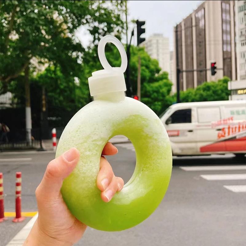Product Introduction of 1Pcs Wholesale 500ML Donuts Water Bottle for Kids Cartoon Silicone Portable Travel Round Cup Portable Anti Fall Plastic Cup Kids Gift 2