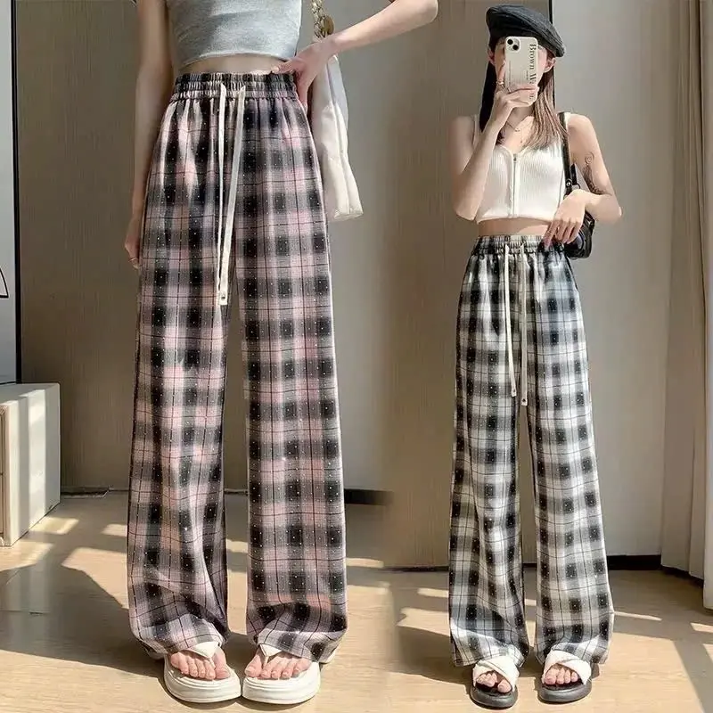 QUẦN XUÔNG KẺ ĐÍNH ĐÁ DỄ PHỐI ĐỒ DỄ MẶC