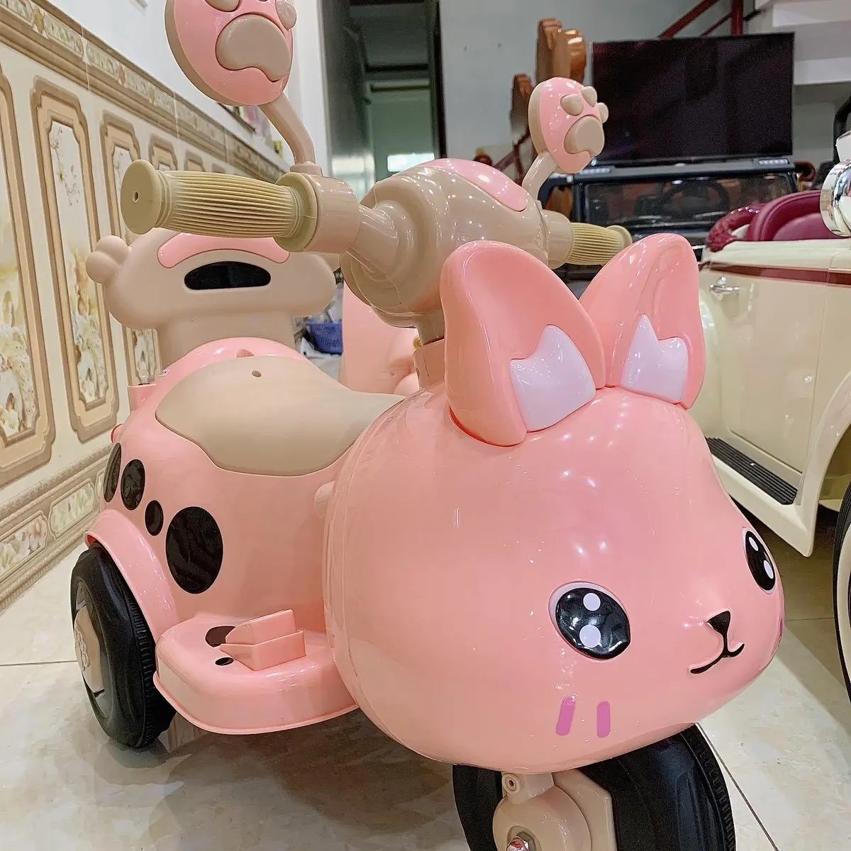 Xe máy thỏ chó bé có chân ga tự lái