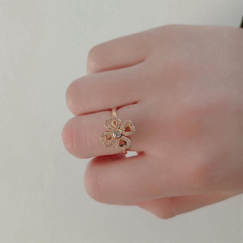 Rotating windmill sunflower ring rotatable open ring - TikTok Shop ...