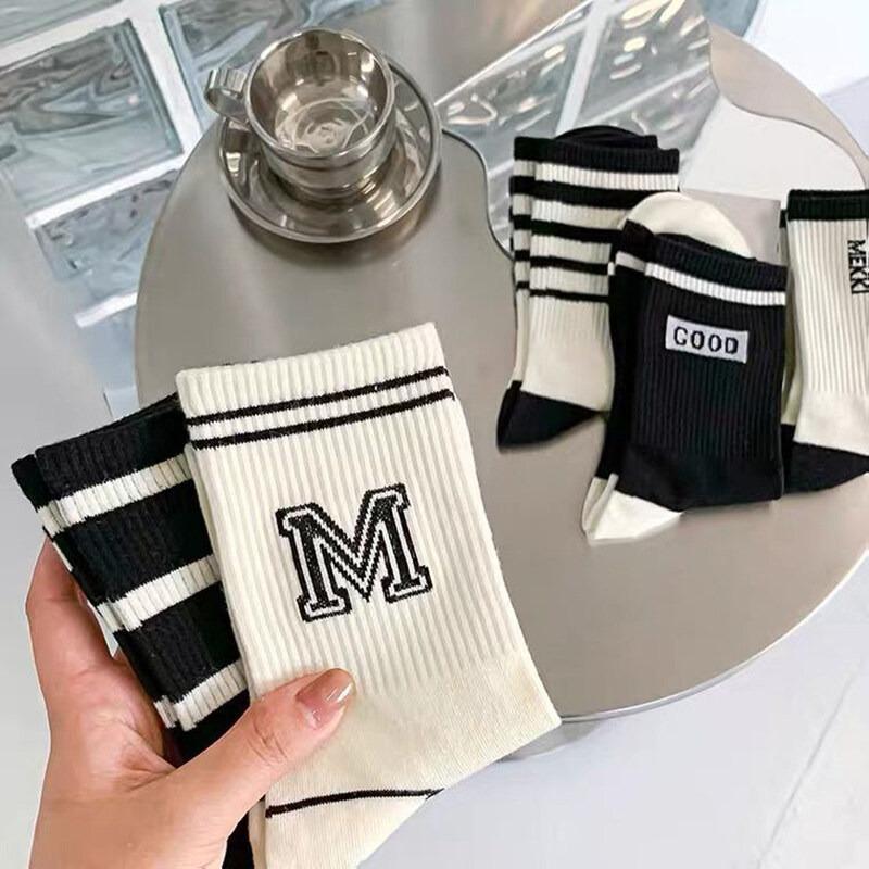 Product Introduction of Simple Black And White Striped Sports Socks 10