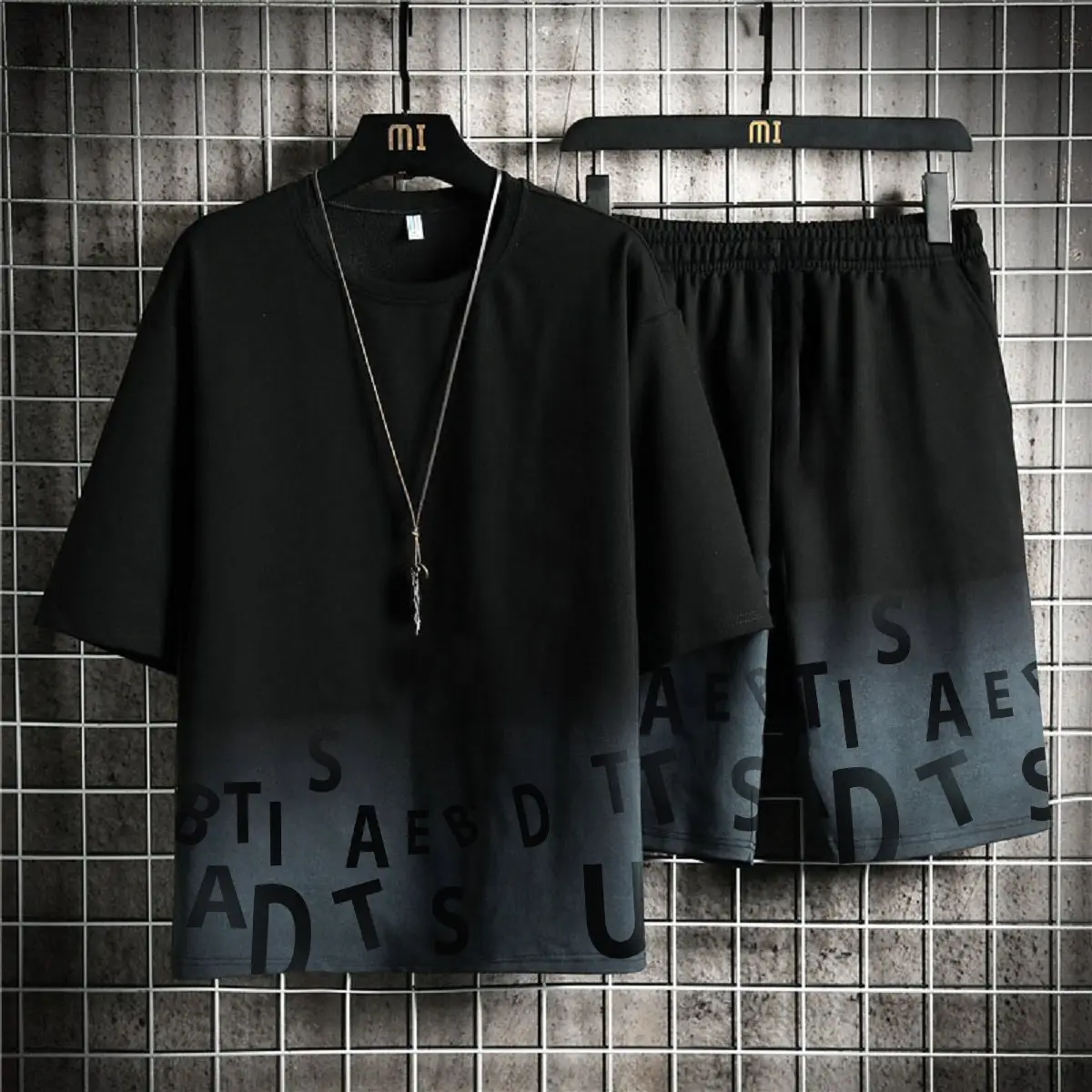 Bộ quần áo thể thao nam nữ thun lạnh co giãn thấm hút mồ hôi hoạ tiết Loang chữ Menswear