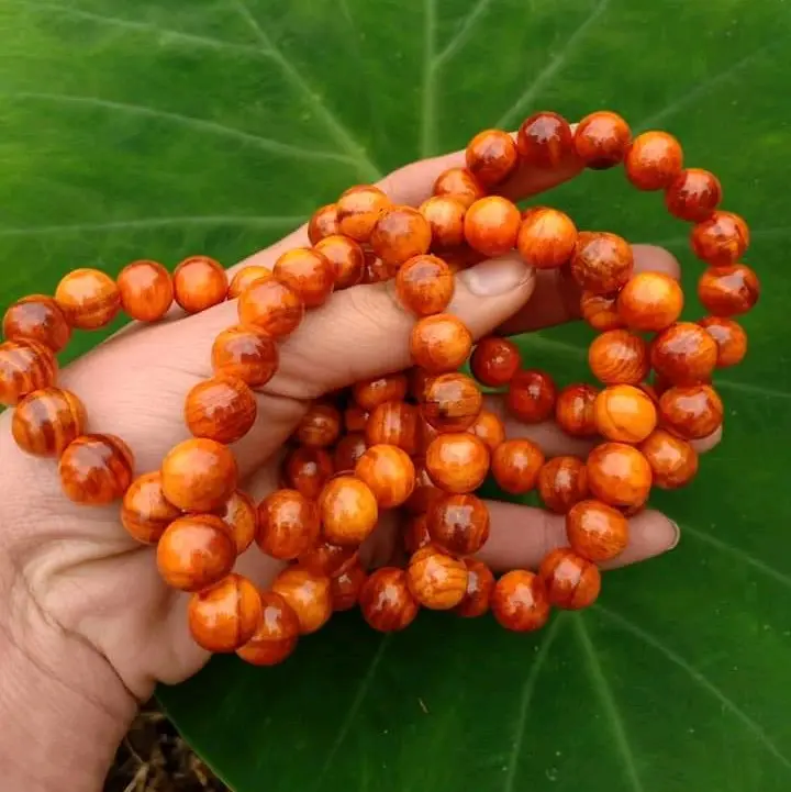 VÒNG TAY GỖ HUYẾT LONG THẤU QUANG 5