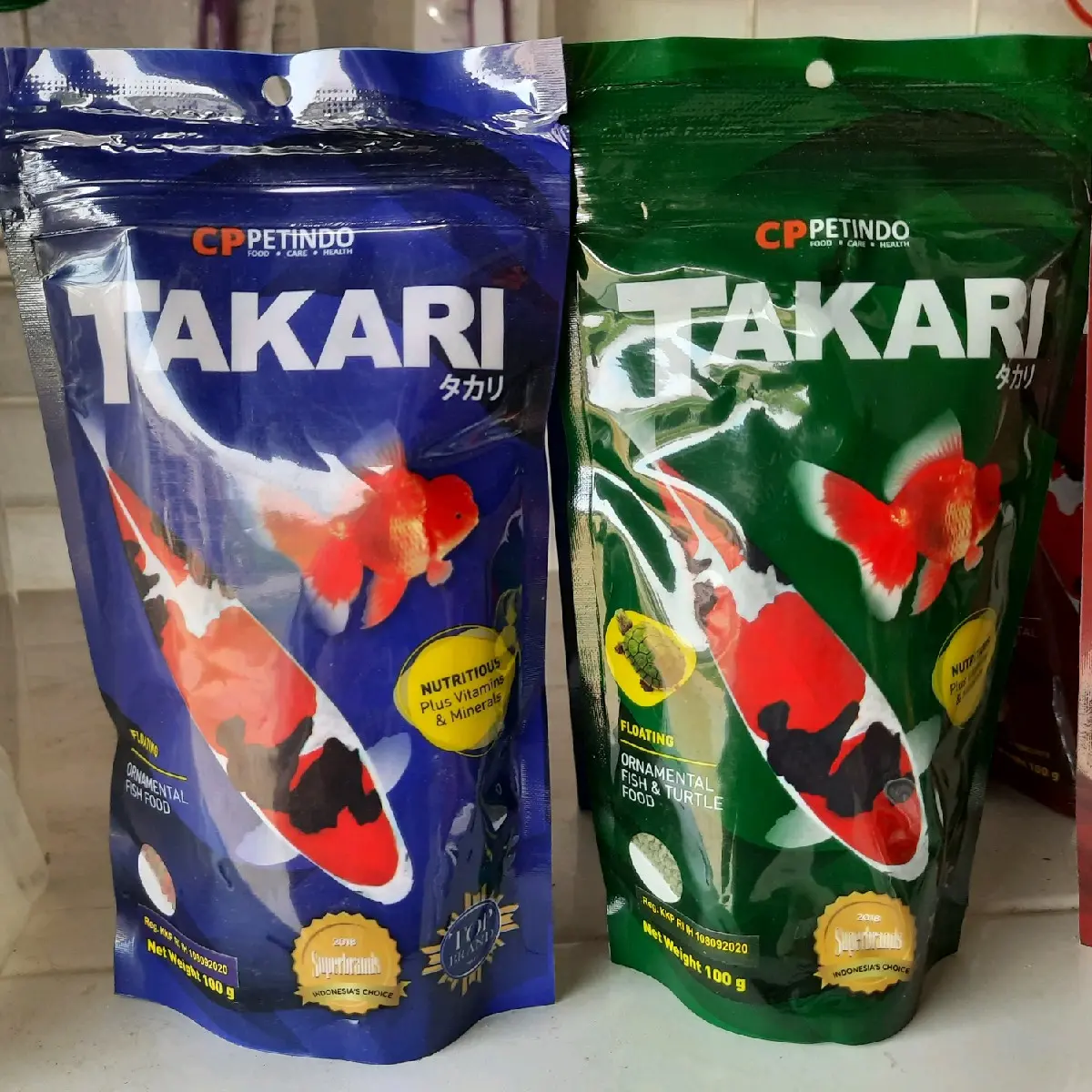 TAKARI PAKAN IKAN 100 GR PELET IKAN HIAS DAN PAKAN KURA KURA
