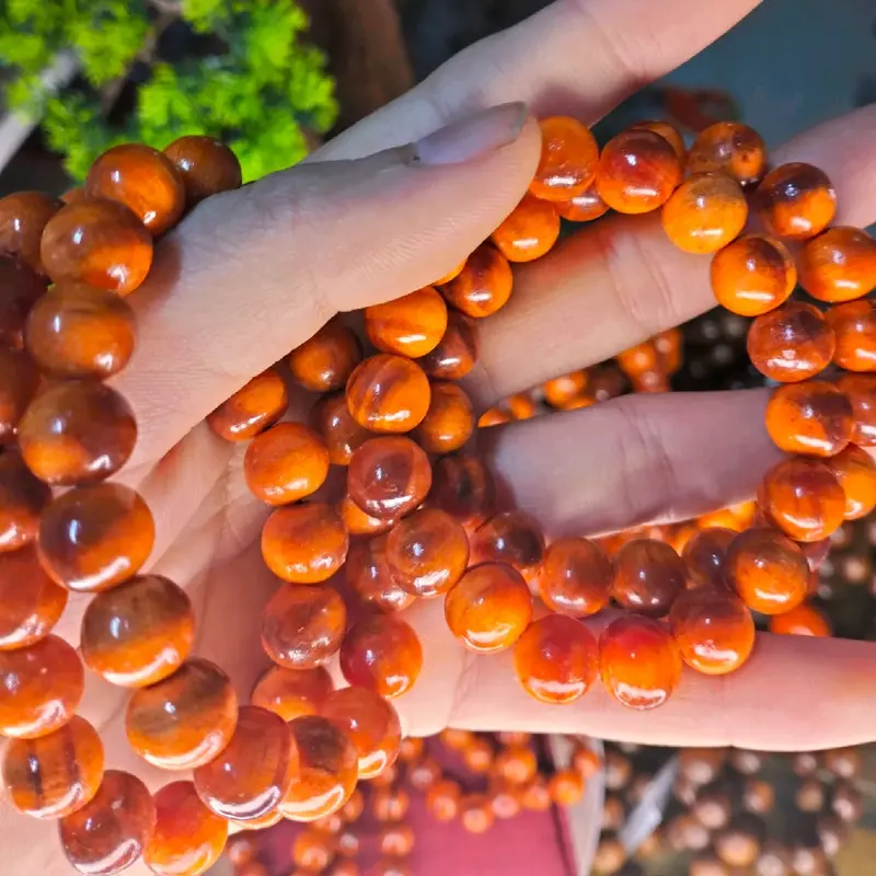 VÒNG TAY GỖ HUYẾT LONG THẤU QUANG 2