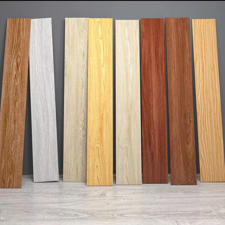 7 tấm Sàn Nhựa KT 1 tấm nguyên 91x15cm có sẵn keo dán Vân sần độ dày gần 2mm tạo không gian rộng rãi