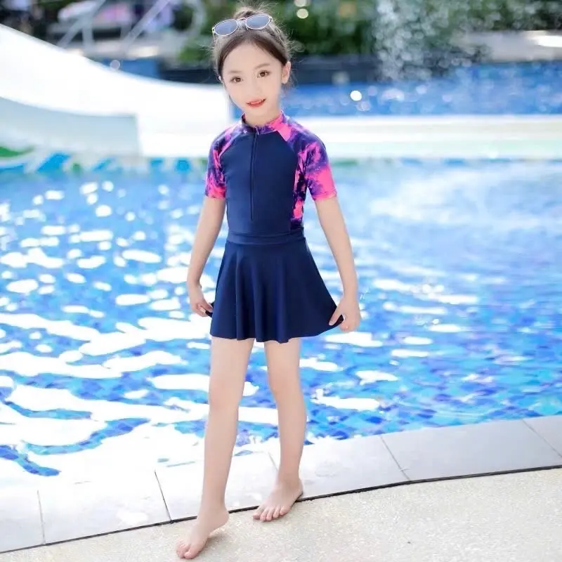 ( Có size Lớn )Đồ Bơi Bé gái  Váy Liền .Chống nắng co giản nhiều size .Ngắn Tay pha Tím Mẫu hót2025 2