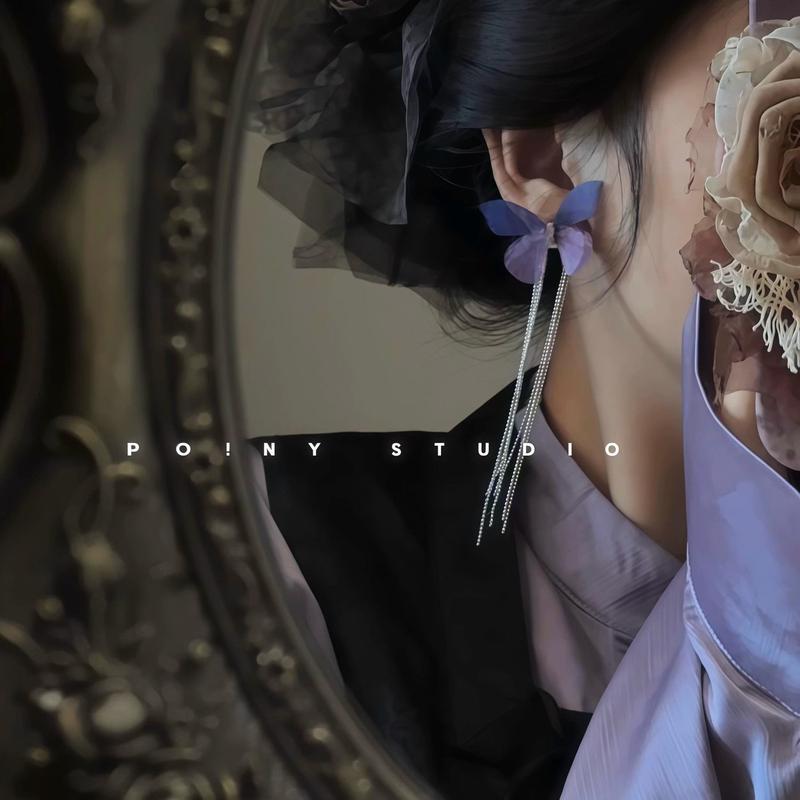 Product Introduction of Super Fairy Purple Butterfly Tassel Earrings for Women, Niche Design, High-end Light Luxury, Elegant Ear Clips for Non-pierced Ears 0