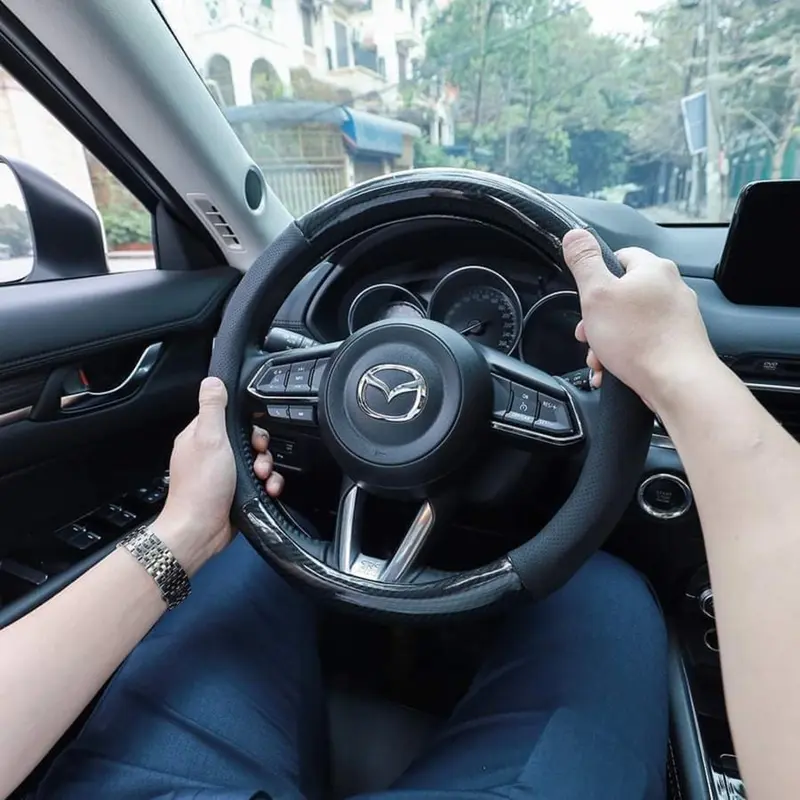 Bọc vô lăng CARBON phối da thoáng khí đủ các hãng xe Toyota-Honda-Hyundai-Mazda-KiA-Ford-Mitshubishi-Chevrolet cao cấp Cacbon 6