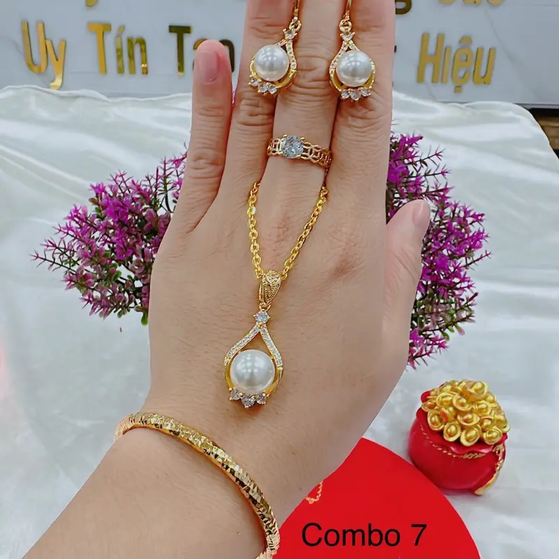 Bộ dây chuyền 4 món dây lắc nhẫn và bông tai( phụ nữ) Cao Su 0