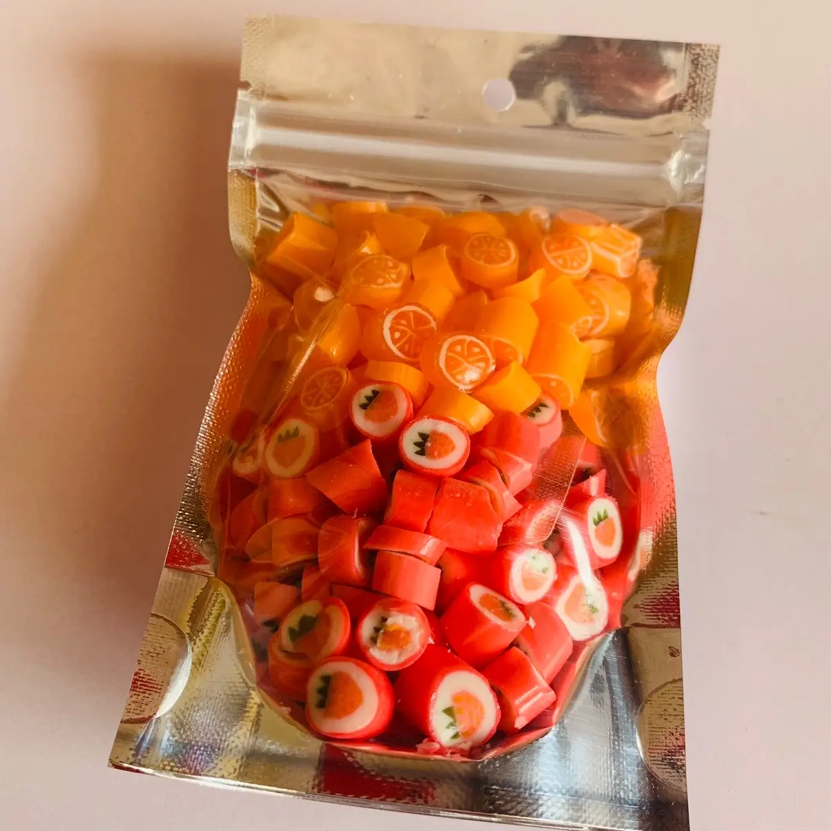 Candy ลูกอมตัด ลูกอมตัดหลากสี ลูกอมแคนดี้ รสส้มผสมสตอเบอร์รี่