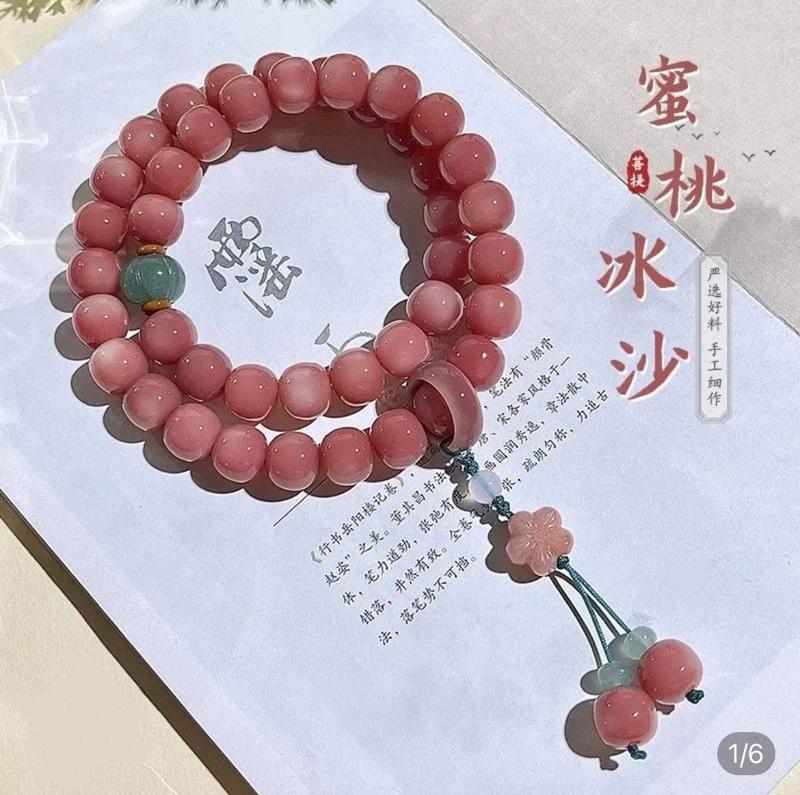 Product Introduction of Pink white jade bodhi root bracelet Female circular finger soft play bodhi Buddha beads student disk play gradient bracelet 8