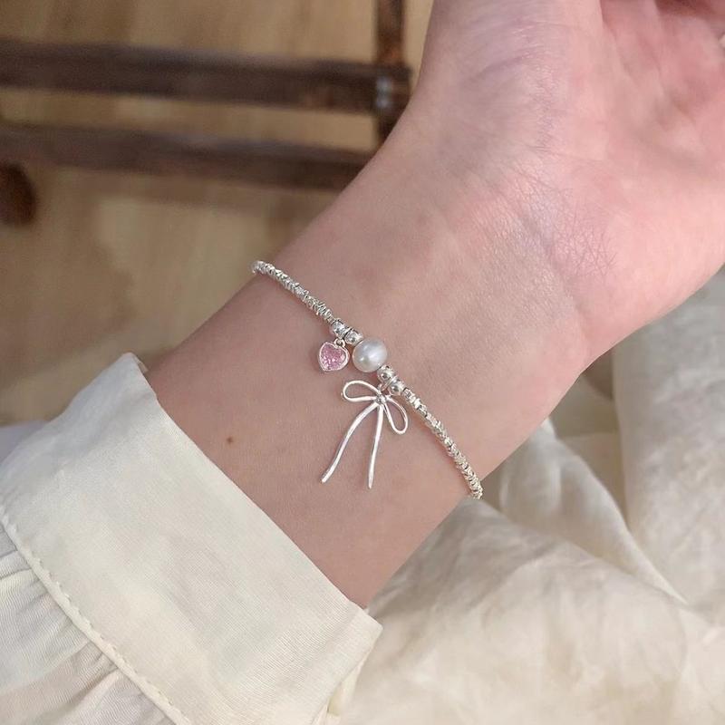 Product Introduction of S925 Loving Heart in Sterling Silver Zircon Bow Small Pieces of Silver Necklace Bracelet Set Ins Niche Temperament Clavicle Chain 17