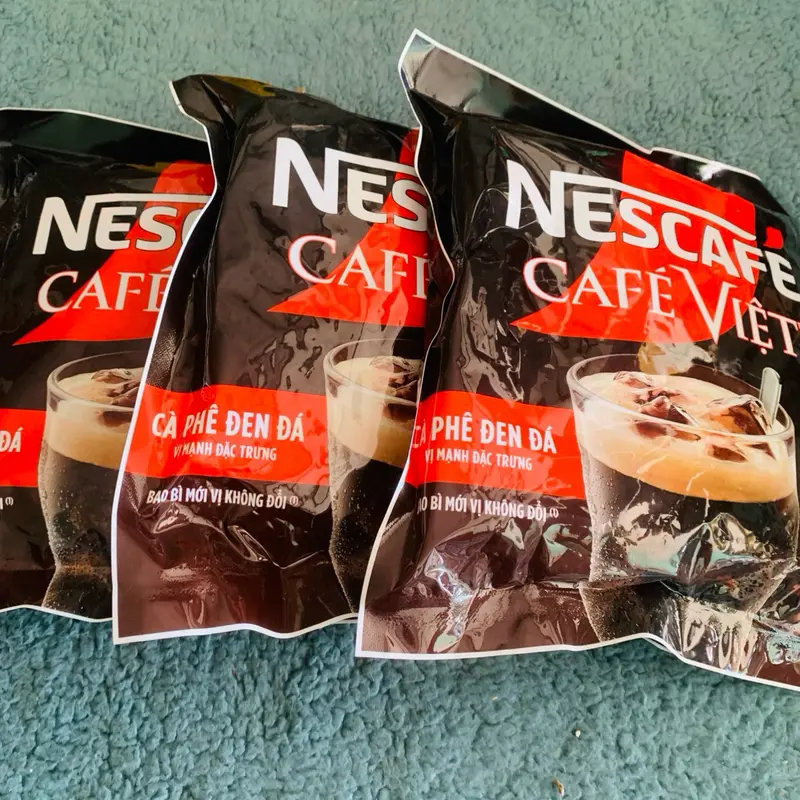 Nes- (tặng 3 gói) Cà phê đen đá NesCafé Café Việt 560g 4