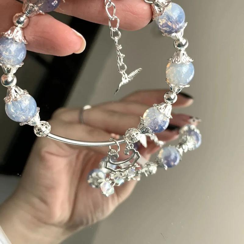 Product Introduction of สร้อยข้อมือ "กระดิ่งลม" แฮนด์เมด สีฟ้า อ่อนโยน น่ารัก จี้ผีเสื้อ เครื่องประดับดั้งเดิม 1