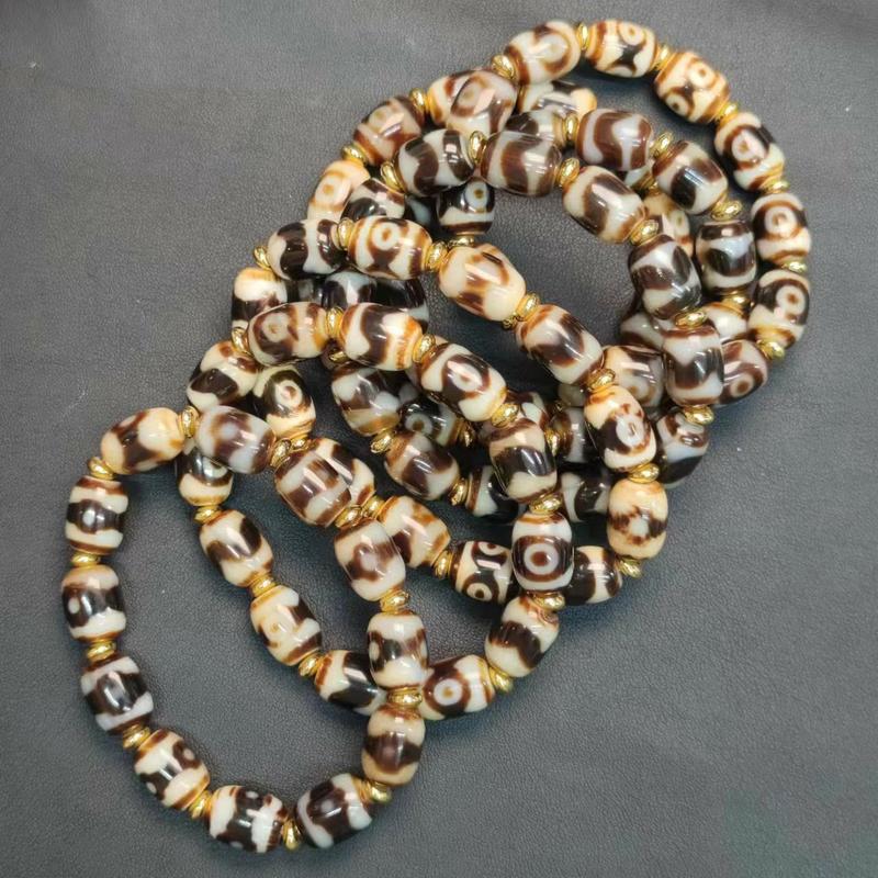 Product Introduction of Natural Gemstone Tiger Tooth Pattern Panda Mandala Three-Eyed Agate Dzi Bead Multi-Treasure Bracelet Tooth Yellow White Core Barrel Bead Unisex Ethnic Style 4