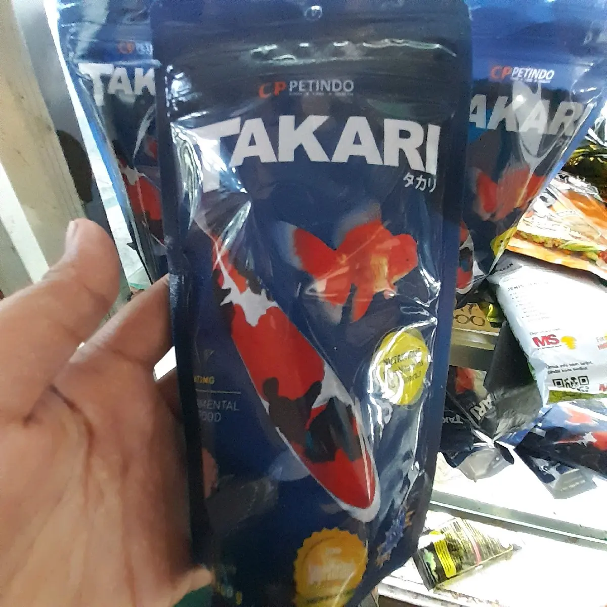 PAKAN IKAN TAKARI butiran kecil