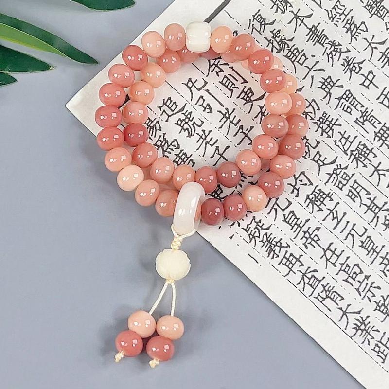 Product Introduction of Pink white jade bodhi root bracelet Female circular finger soft play bodhi Buddha beads student disk play gradient bracelet 14