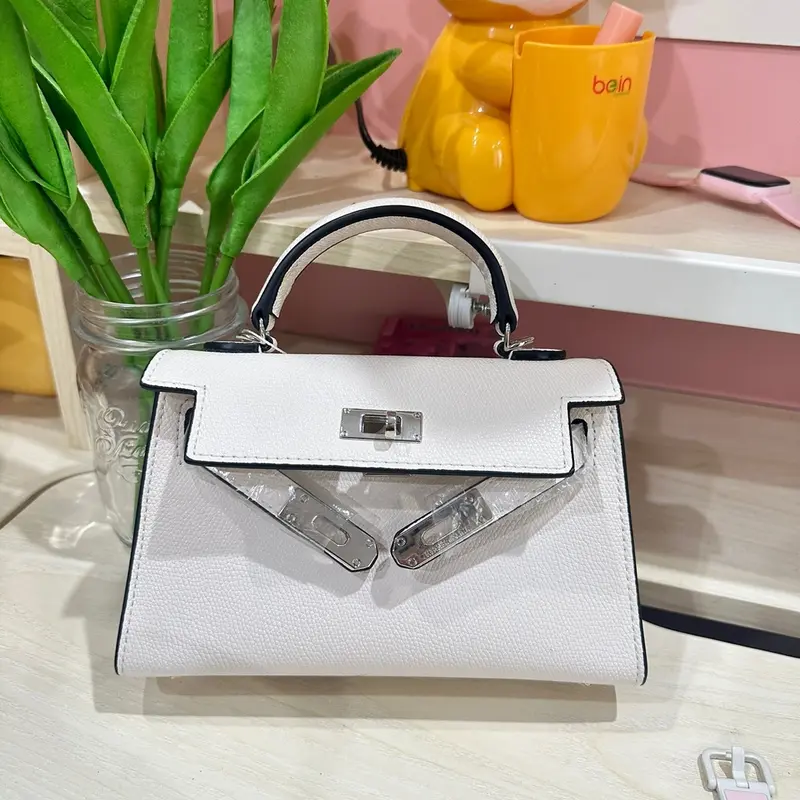 Túi xách nữ h..m dáng lùn size 19 0