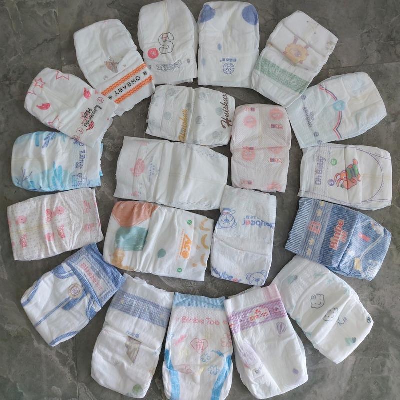 100 bỉm dán tặng kèm quà cho bé sz NB,S,M,L,XL