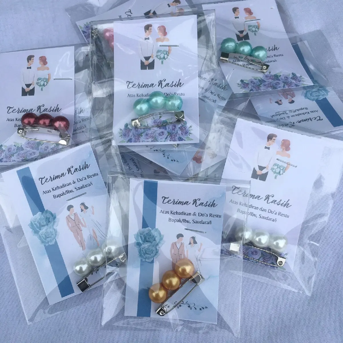 Souvenir Bross Mutiara Isi 50