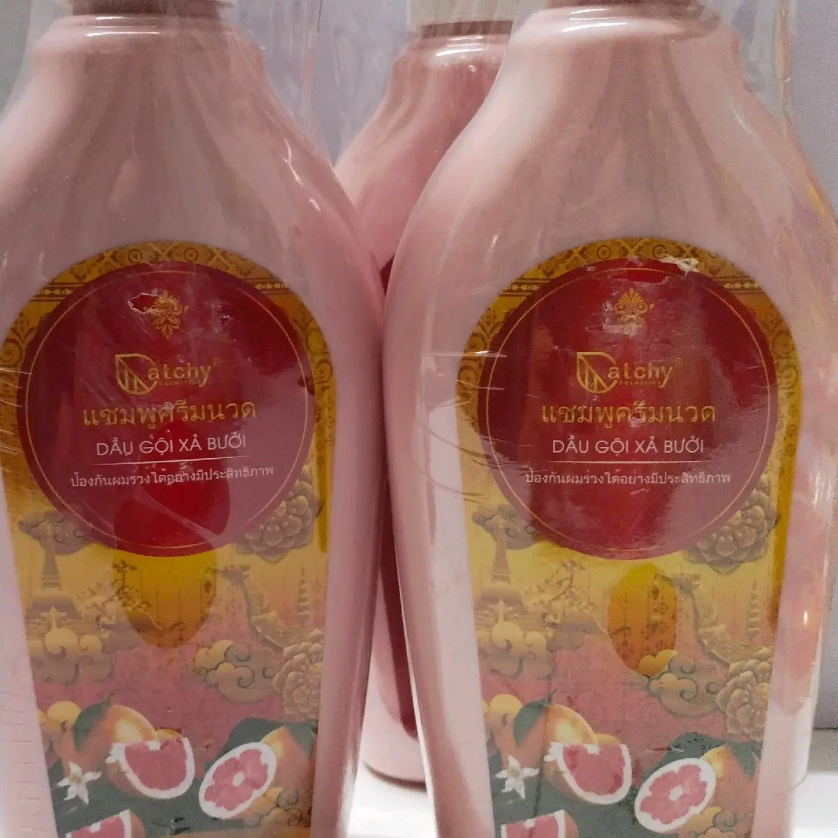 dầu gội vỏ bưởi hồng ngăn ngừa và cải thiện tình trạng rụng tóc, giúp mọc tóc ( thể tích 650ml)