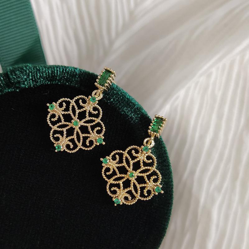 Product Introduction of Synthetic Zircon Inlaid Earrings, Classic Hollow Earrings, Women'S Retro Palace Earrings 0