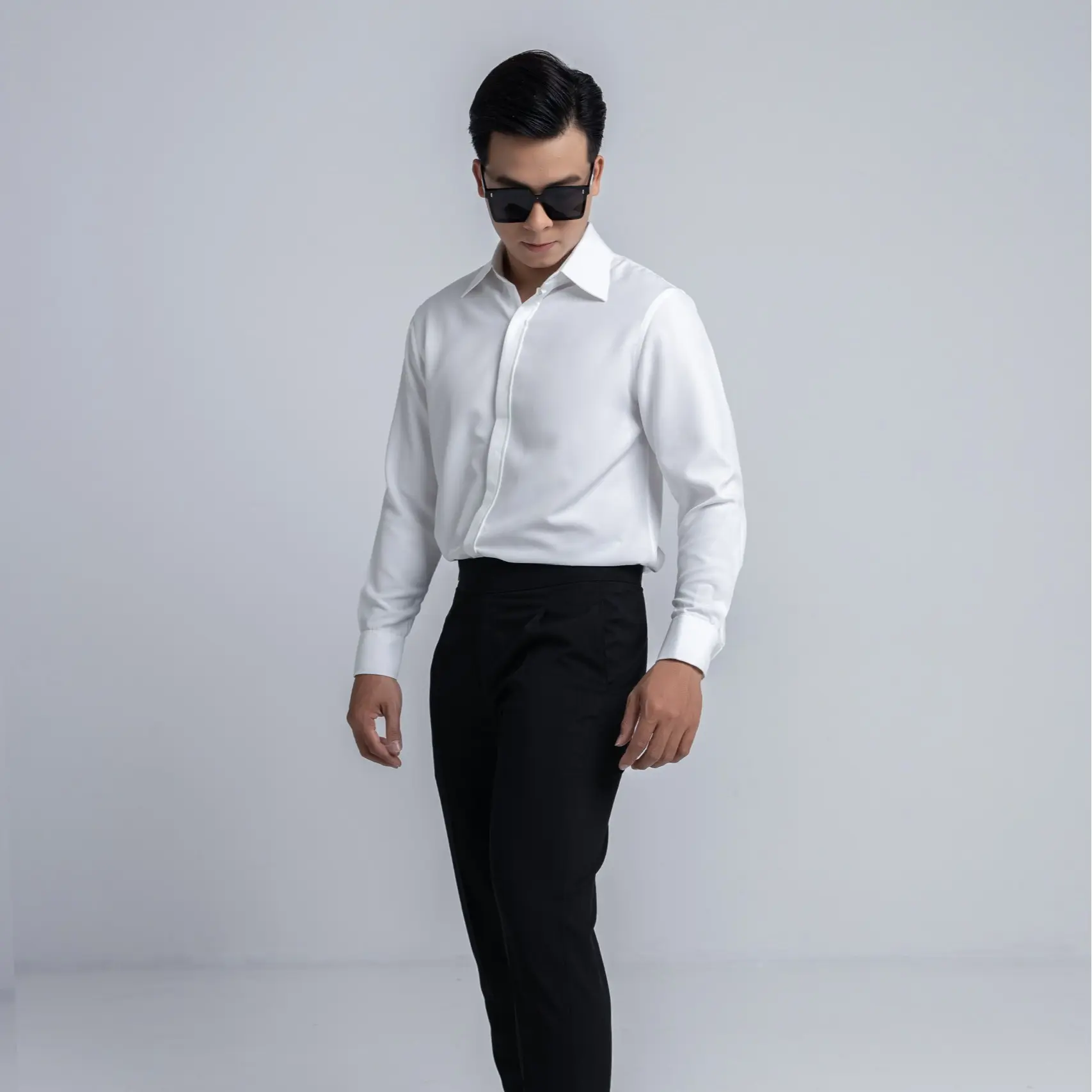 Áo Sơ Mi trơn tay dài Imene trắng - đen, chất vải cotton lạnh hạn chế nhăn.