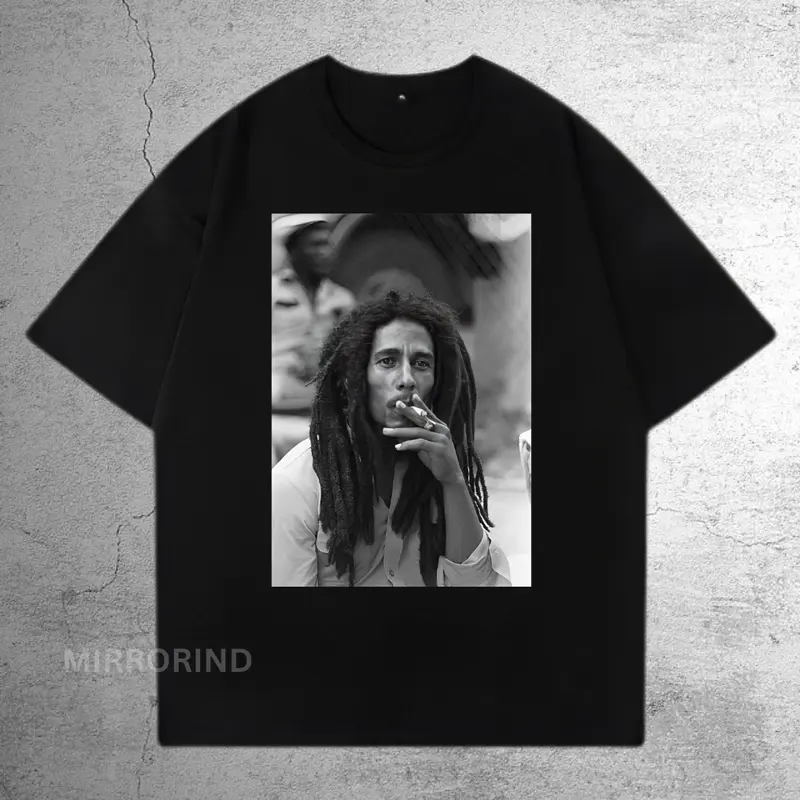 KAOS DISTRO PRIA WANITA MOTIF BAND MUSIK BOB MARLEY LENGAN PENDEK SEMI KATUN 24s PREMIUM QUALITY Hitam Nyaman 0