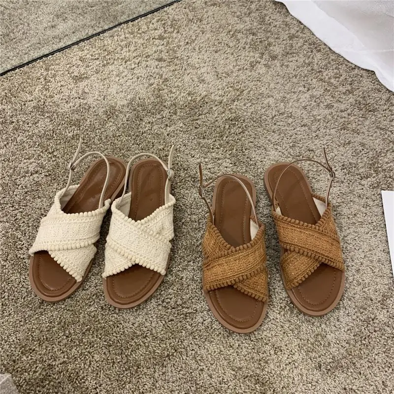 Ethnic style sandals women's summer flat 2025 new versatile Bohemian fairy style student cross strap Roman shoes