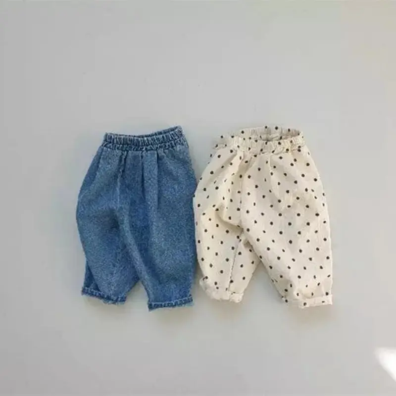 Quần dài cho bé trai và bé gái màu xanh và bi đen 0