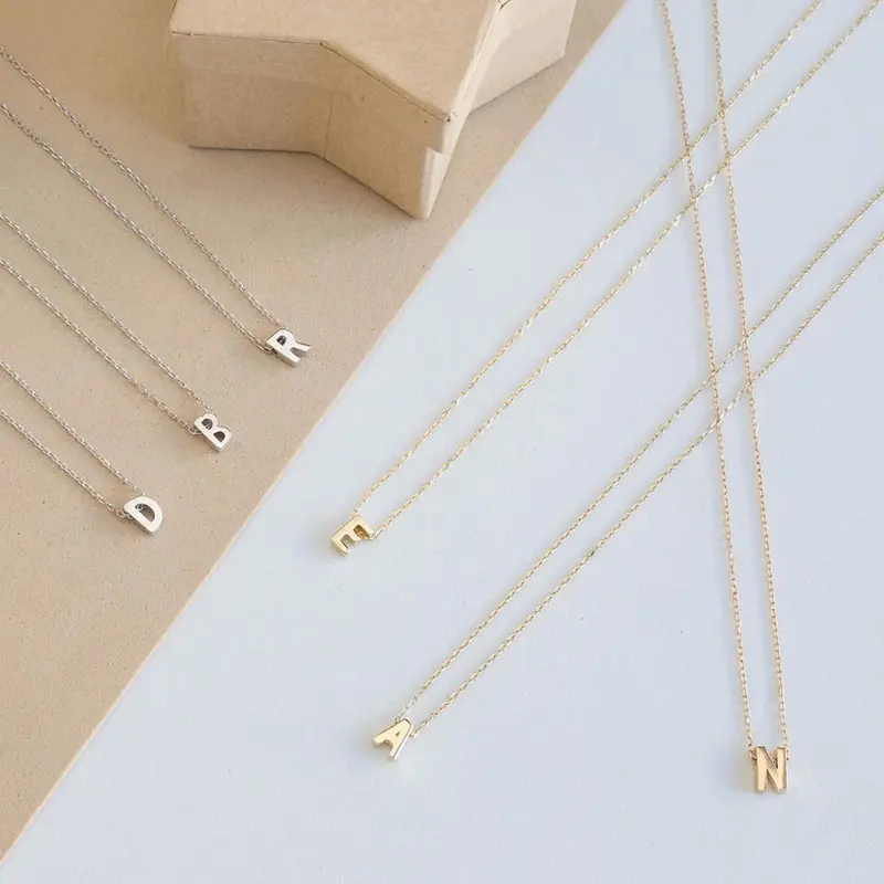 Kalung liontin huruf wanita /kalung inisial asli titanium 2