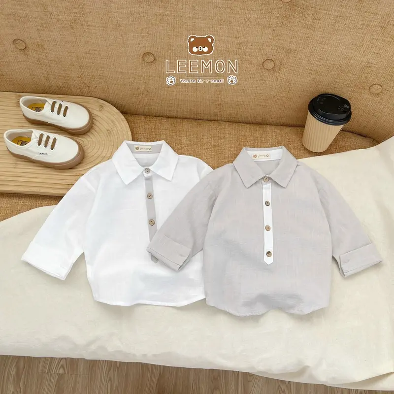 Áo sơ mi dài tay đũi phối khuy hai màu cho bé trai 1