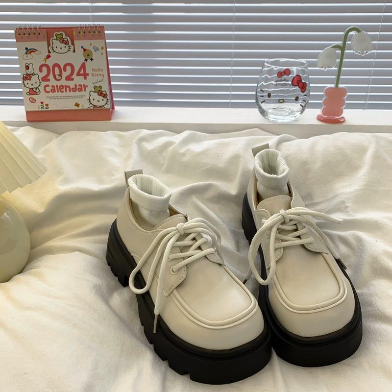 Giày đốc nữ có dây da mềm có hai màu đen và trắng nữ