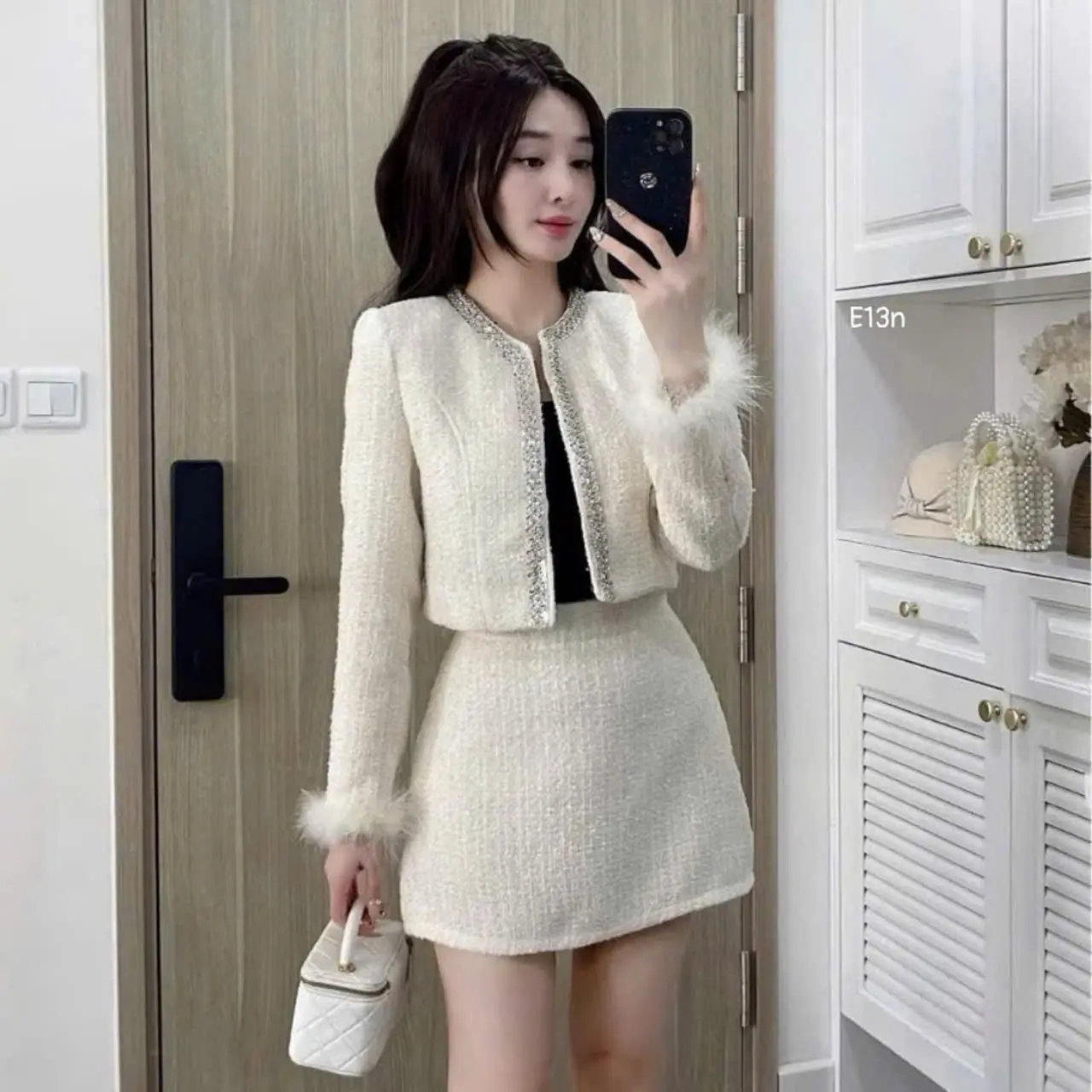 ￼Váy dạ nữ áo tay dài đính lông
